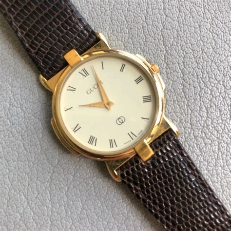 gucci watch 18k gold